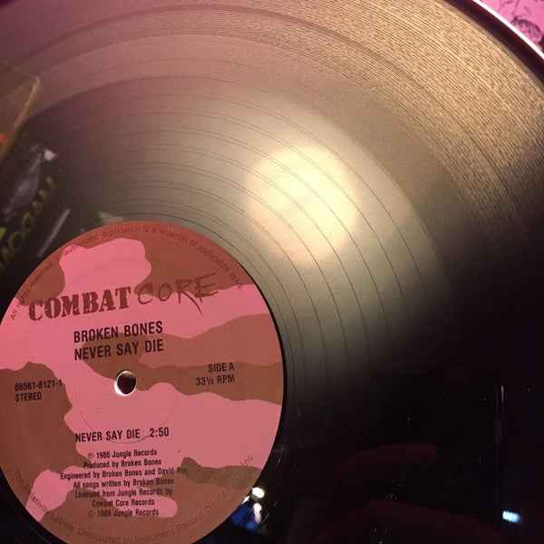 Broken Bones - Never Say Die 12" (Combat CoreVinyl, 12", 33 ⅓ RPMVery Good Plus (VG+))